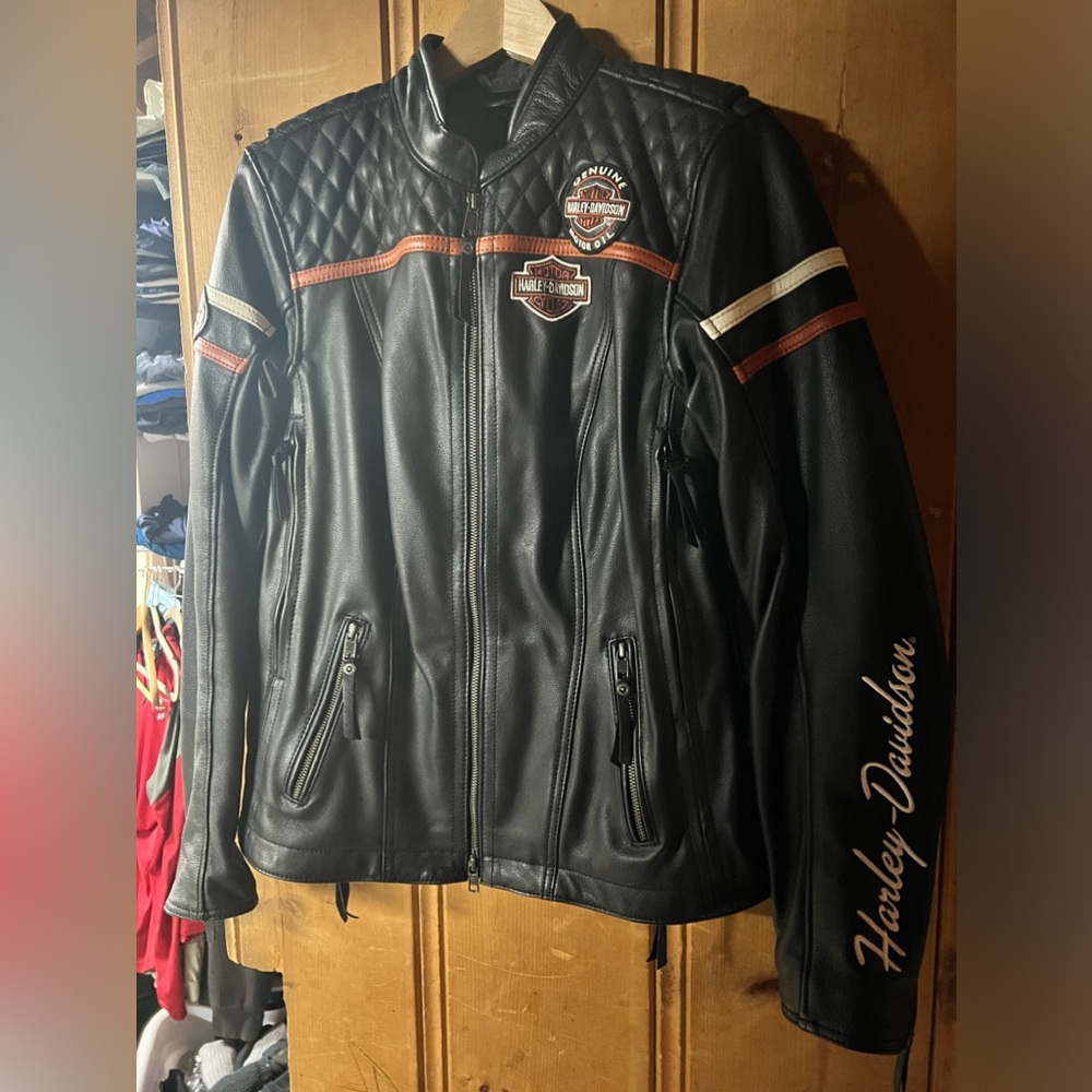 Worn once! Like new heavy leather Harley Davidson woman’s biker jacket